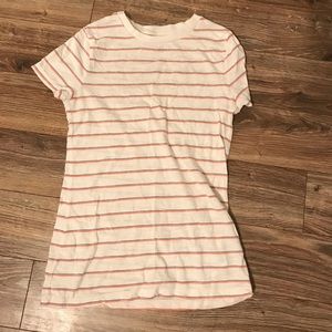 an orange , blue and cream stripe color shirt